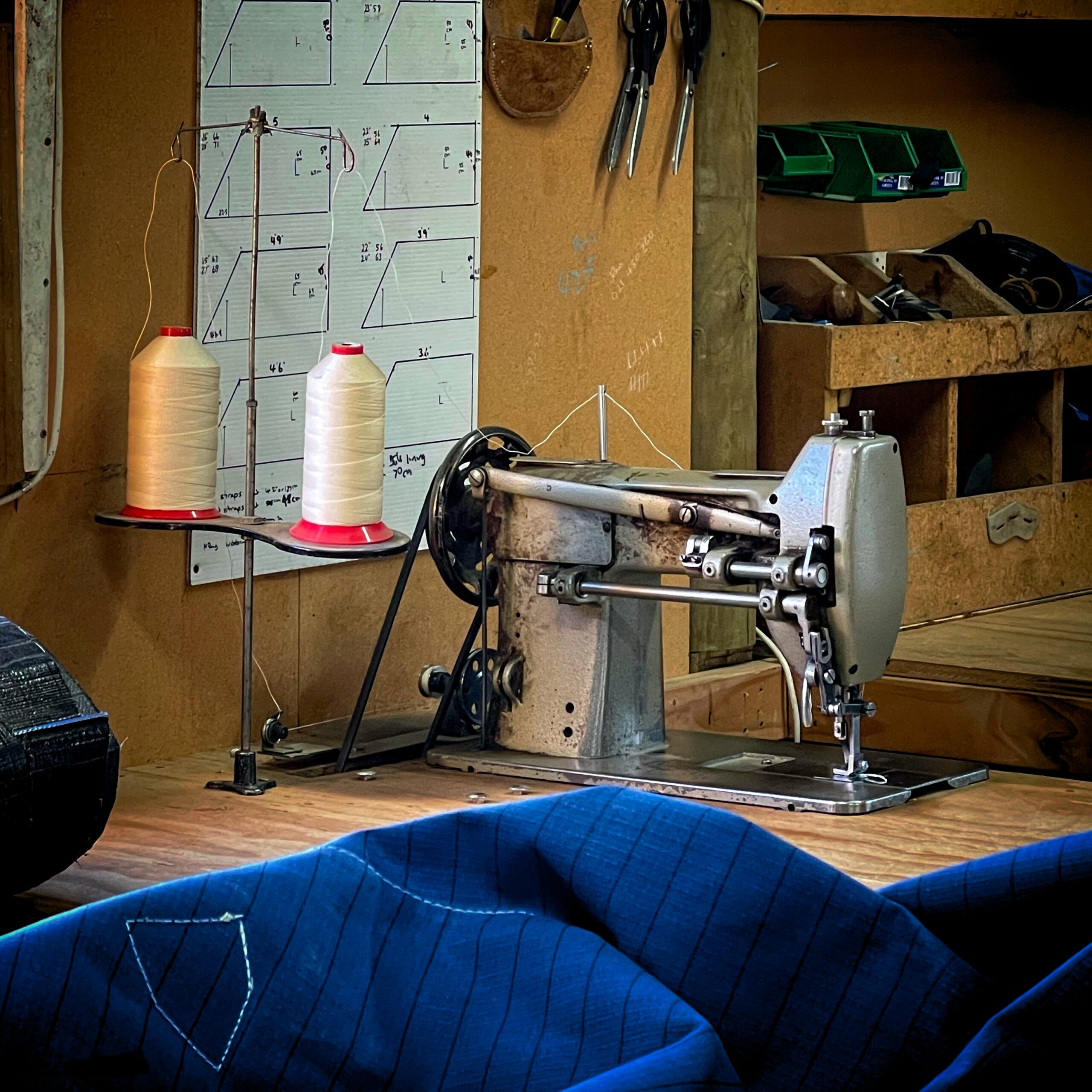 Canvas product and sewing machine in workshop