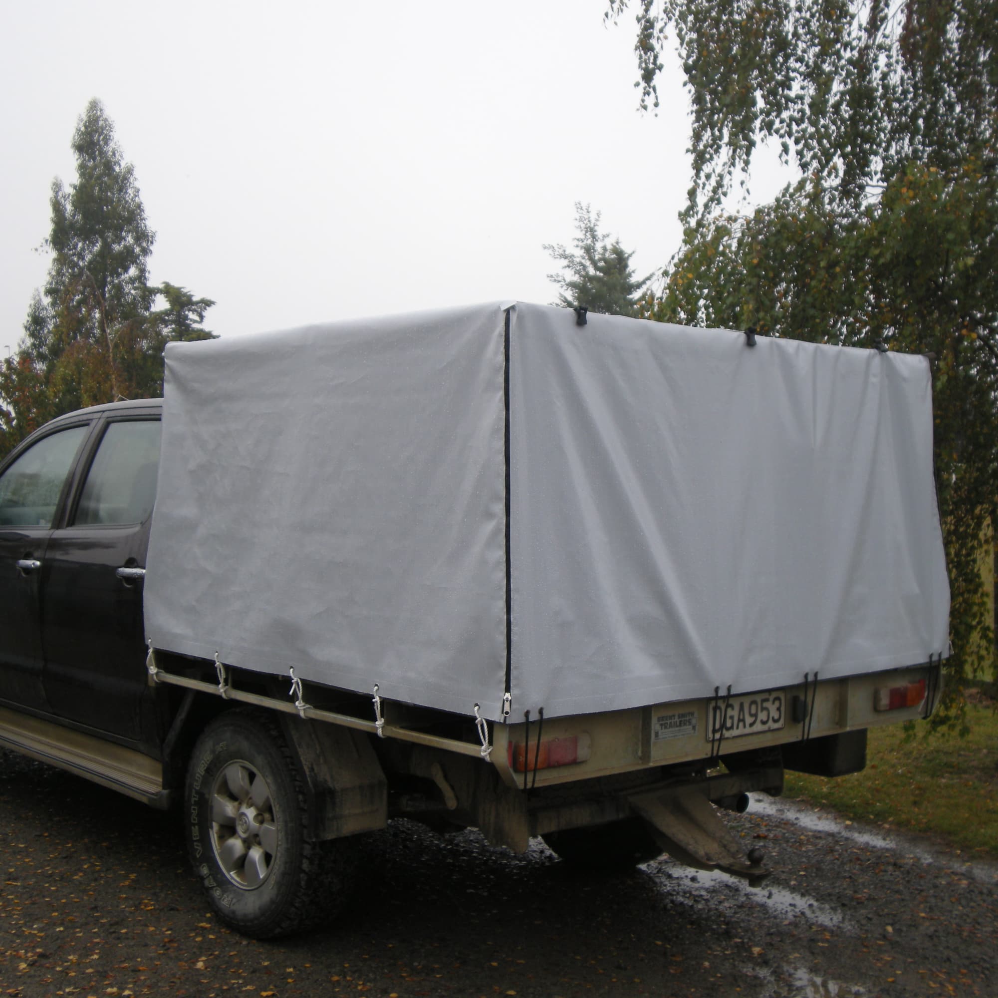 Picture of a truck with a cover on it